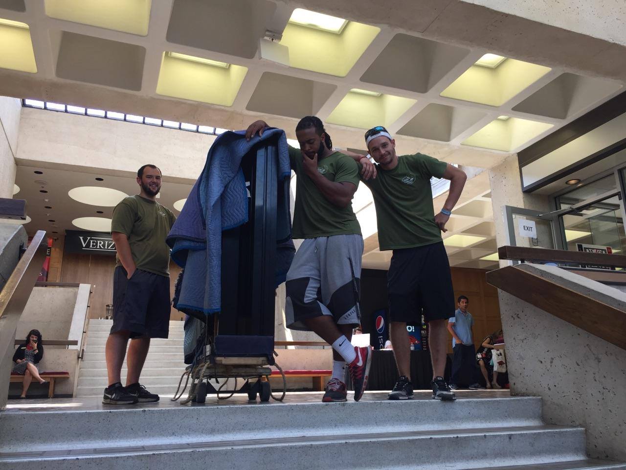 Some folks might think a baby grand piano is tough to move but not Little Guys Movers.