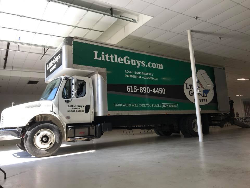murfreesboro moving little guys movers truck inside building
