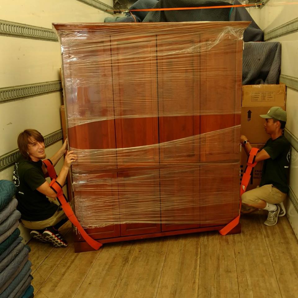 bryan college station moving company with large armoire