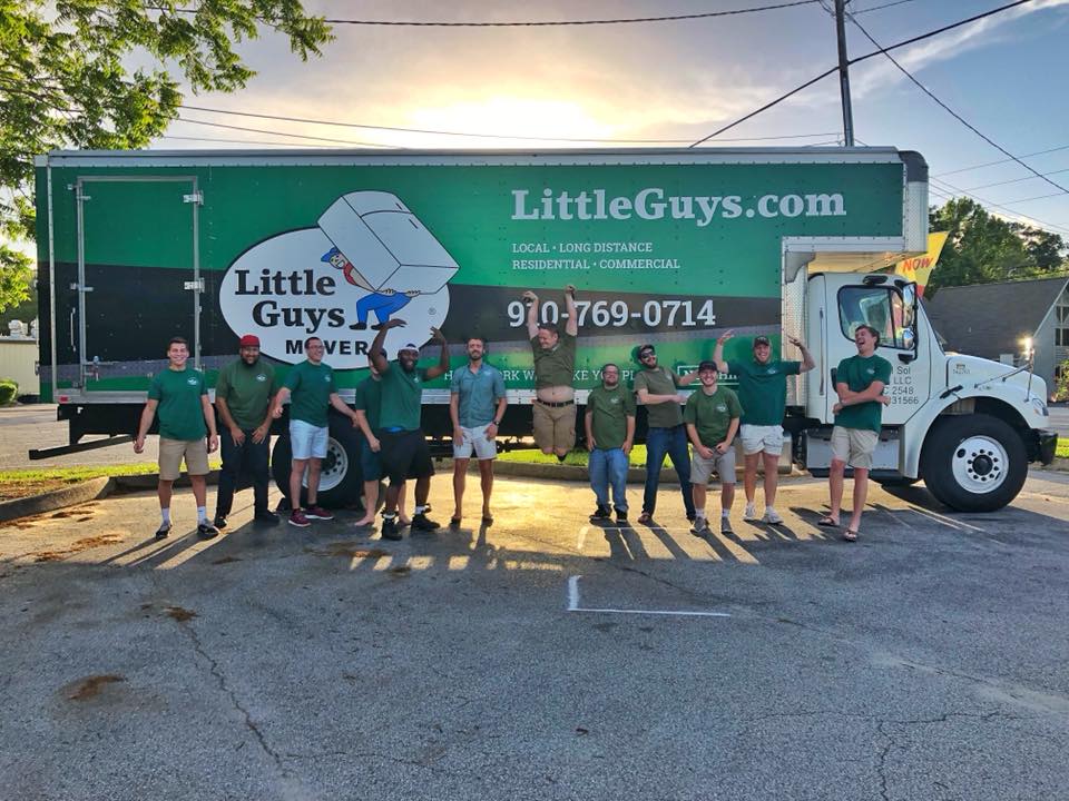 wilmington little guys movers in front of truck
