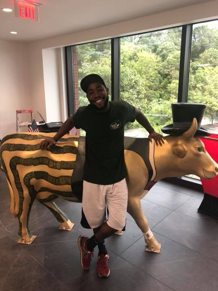 little guys austin business movers with cow decoration