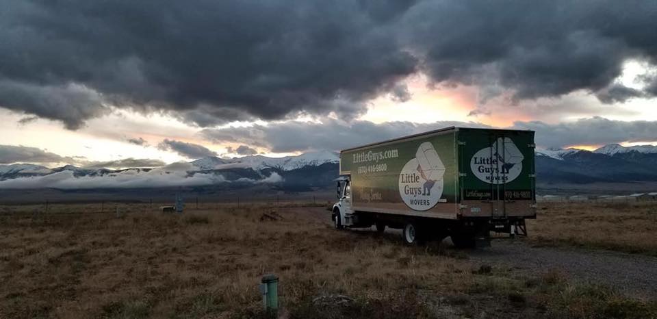 little guys movers fort collins traveling careers truck in front of mountains
