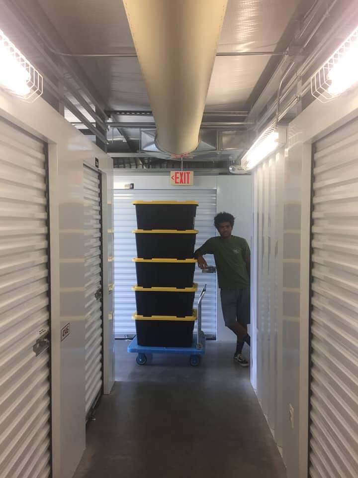 mover in murfreesboro storage unit with boxes