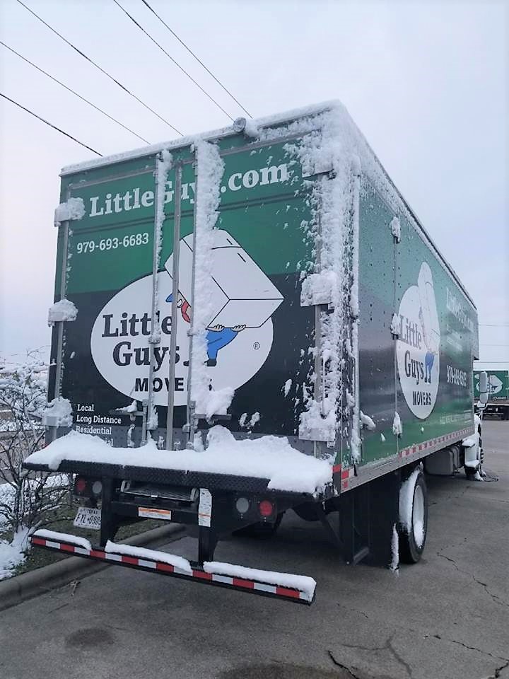 little guys movers winter moving tips truck covered in snow