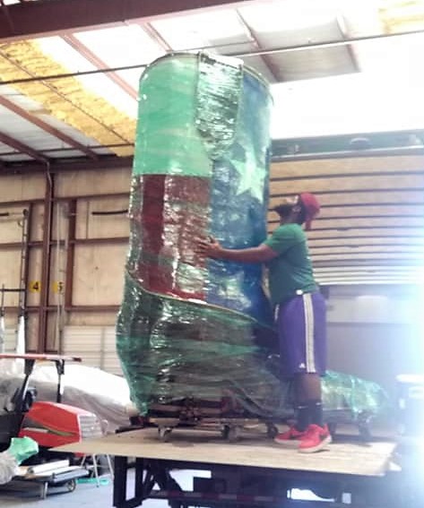 little guys san marcos packing services packing up giant boot statue